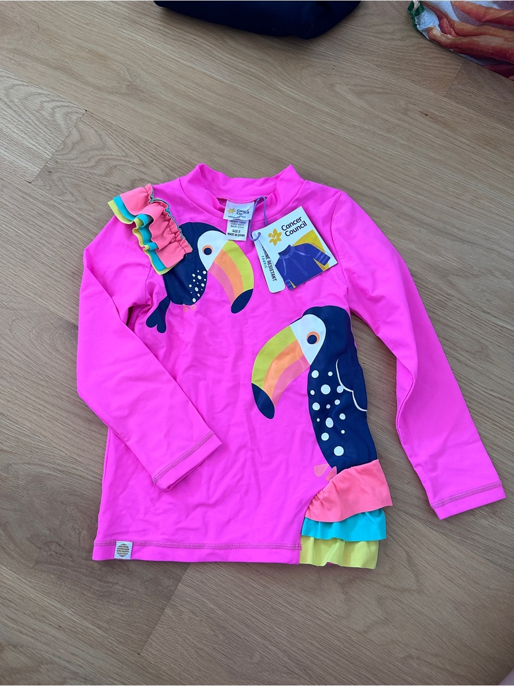Kids Pink Toucan Long-Sleeve Rashguard with Ruffle Hem